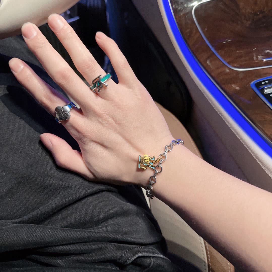 Louis Vuitton Silver Bracelet with LV Logo Charm